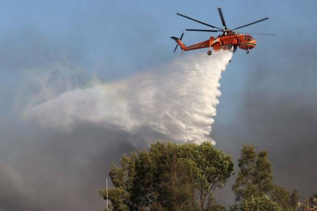 Riau Siagakan 12 Helikopter Water Bombing untuk Cegah Karhutla